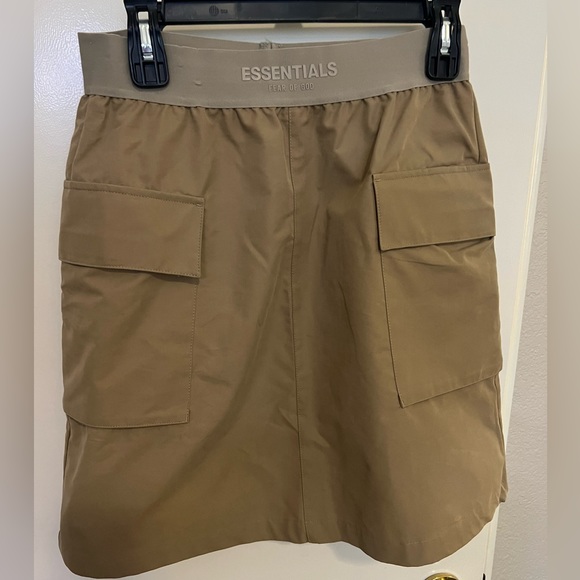 Essentials Dresses & Skirts - Tan essentials skirt with big front pockets, size medium